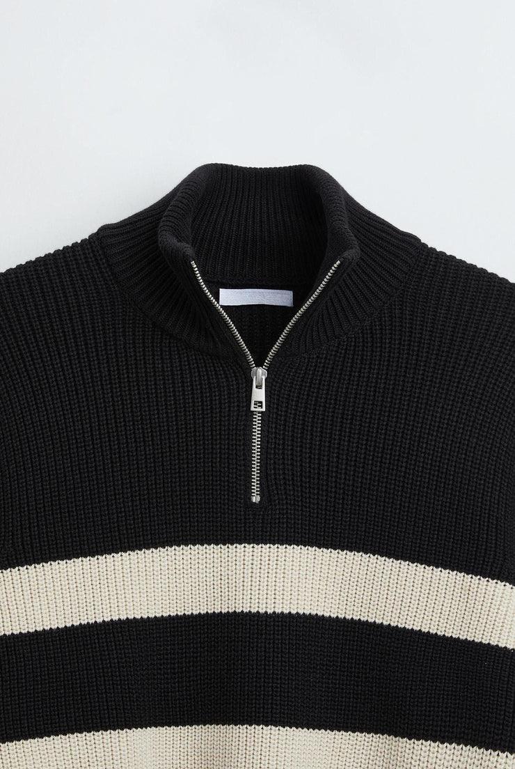 Knitted sweater with white stripes