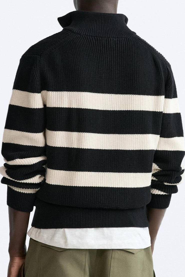 Knitted sweater with white stripes